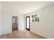 Bright, airy room with a modern bathroom, private entrance, and a view of tropical palm trees at 12620 N 70Th St, Scottsdale, AZ 85254