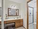 A bathroom featuring a vanity, mirror, and shower with a glass enclosure at 1459 S Mara Dr, Apache Junction, AZ 85120