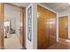 Hallway view with doors to bedroom and closet providing seamless transition and storage at 1459 S Mara Dr, Apache Junction, AZ 85120