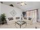 Bright living room with plush seating, stylish decor, and a vaulted ceiling at 1459 S Mara Dr, Apache Junction, AZ 85120