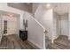 Welcoming foyer with stylish flooring, staircase, and modern decor, creating a warm first impression at 15604 N 173Rd Ln, Surprise, AZ 85388