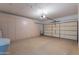 Spacious garage includes custom storage cabinets and epoxy flooring at 15903 N 138Th Ave, Surprise, AZ 85374