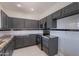 Modern kitchen featuring granite countertops, stainless steel appliances, and stylish backsplash at 15903 N 138Th Ave, Surprise, AZ 85374