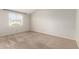Bright bedroom with neutral carpet and white walls, offering a serene and adaptable space at 1616 S Torre Molinos Cir, Tempe, AZ 85281