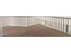 Hallway with carpeted floor and white railing at 1616 S Torre Molinos Cir, Tempe, AZ 85281