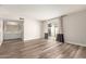 Bright living room featuring wood floors and sliding door to patio at 1616 S Torre Molinos Cir, Tempe, AZ 85281