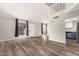 Open concept floor plan with hardwood floors, lots of light, and a loft above at 1616 S Torre Molinos Cir, Tempe, AZ 85281