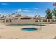 Community pool with spa and sun deck, offers a luxurious outdoor experience for residents at 1616 S Torre Molinos Cir, Tempe, AZ 85281