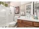 Bathroom featuring a shower, vanity, and toilet at 16670 N 109Th Way, Scottsdale, AZ 85255