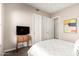 Bedroom features neutral walls, ceiling fan and closet space for ample storage at 16670 N 109Th Way, Scottsdale, AZ 85255