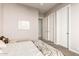 Bedroom features neutral walls, ceiling fan and closet space for ample storage at 16670 N 109Th Way, Scottsdale, AZ 85255