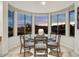 Cozy breakfast nook at sunset with ample natural light and charming views at 16670 N 109Th Way, Scottsdale, AZ 85255