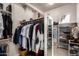 Walk-in closet with shelving and plenty of storage for clothes and accessories at 16670 N 109Th Way, Scottsdale, AZ 85255