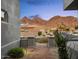 Courtyard view with desert landscaping, paver walkway, and mountain views in the background at 16670 N 109Th Way, Scottsdale, AZ 85255