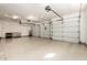 Spacious three car garage with sealed floors and overhead storage at 16670 N 109Th Way, Scottsdale, AZ 85255