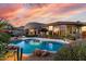 Inviting backyard oasis with a sparkling pool, spa, mature landscaping, and scenic views at 16670 N 109Th Way, Scottsdale, AZ 85255