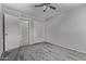 Comfortable bedroom featuring soft carpet, ceiling fan, and access to bathroom and closets, offering privacy at 17242 N 16Th Dr # 6, Phoenix, AZ 85023