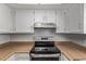 Clean kitchen boasting a stainless steel oven, ample counter space and overhead cabinets for a modern cooking experience at 17242 N 16Th Dr # 6, Phoenix, AZ 85023