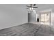 Open living space with new carpet and tile floors leading to the kitchen and dining area at 17242 N 16Th Dr # 6, Phoenix, AZ 85023