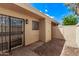 Private patio with a secure, gated door and security door providing additional safety and protection at 17242 N 16Th Dr # 6, Phoenix, AZ 85023