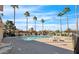 Community pool has plenty of seating and lounge space with well maintained grounds and an inviting atmosphere at 17242 N 16Th Dr # 6, Phoenix, AZ 85023