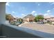 Neighborhood street with well-maintained houses under a blue sky showcasing a desirable community at 1731 E Evans Dr, Phoenix, AZ 85022