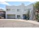 Contemporary two-story home with a striking white exterior, two-car garage and drought-tolerant landscaping at 1731 E Evans Dr, Phoenix, AZ 85022