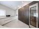 Modern kitchen showcases sleek white cabinetry, stainless steel appliances, and a wine refrigerator at 1731 E Evans Dr, Phoenix, AZ 85022