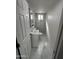 Modern bathroom featuring stylish tile floors and a walk-in shower, perfect for comfort and convenience at 2027 E Michelle Dr, Phoenix, AZ 85022
