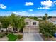 Aerial view of a two-story home with a three-car garage, mature trees, and well-maintained landscaping at 2069 S Sailors Ct, Gilbert, AZ 85295