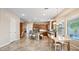 Open-concept kitchen featuring wood cabinets, an island, and a breakfast nook at 2069 S Sailors Ct, Gilbert, AZ 85295