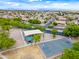 Overhead shot of a park including a covered picnic area, basketball court, and sand volleyball at 2069 S Sailors Ct, Gilbert, AZ 85295