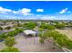 Aerial view of the community park with playground, sports amenities, and lush greenery at 2069 S Sailors Ct, Gilbert, AZ 85295