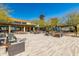 Community clubhouse featuring a large outdoor area with seating and views at 20698 W Meadowbrook Ave, Buckeye, AZ 85396