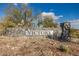Community entrance with stone monument and the word 'Victory' in metal letters at 20698 W Meadowbrook Ave, Buckeye, AZ 85396