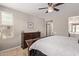 Relaxing main bedroom with dresser, natural light, and neutral color palette at 20698 W Meadowbrook Ave, Buckeye, AZ 85396
