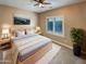 Cozy bedroom with comfortable bed, soft lighting, and serene decor at 2088 N 164Th Ave, Goodyear, AZ 85395
