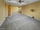Bright living room with neutral carpet and versatile layout at 2088 N 164Th Ave, Goodyear, AZ 85395