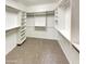 Spacious walk-in closet with shelving and racks for storage at 2088 N 164Th Ave, Goodyear, AZ 85395
