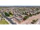 Beautiful aerial view of a single-Gathering home nestled in a well-maintained residential neighborhood, featuring a defined property line at 20941 E Pecan Ln, Queen Creek, AZ 85142