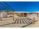 Extensive backyard with a pergola, shed, and covered patio, perfect for outdoor activities at 2131 W Verde Ln, Phoenix, AZ 85015