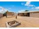 Large backyard showcasing a pergola, shed, fire pit, and covered patio, perfect for entertaining and relaxation at 2131 W Verde Ln, Phoenix, AZ 85015