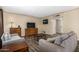 Comfortable living room with wood-look floors and furnishings perfect for relaxation at 2131 W Verde Ln, Phoenix, AZ 85015