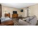 Comfortable living room with wood-look floors and furnishings perfect for relaxation at 2131 W Verde Ln, Phoenix, AZ 85015
