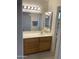 Bathroom with single sink vanity and mirror at 2152 S Olivewood --, Mesa, AZ 85209