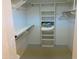 Walk-in closet with shelving and hanging racks to maximize storage space at 2152 S Olivewood --, Mesa, AZ 85209