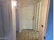 Inviting entryway with tiled flooring, leading to a bright, welcoming interior at 2152 S Olivewood --, Mesa, AZ 85209