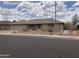 Inviting single-story home featuring desert landscaping, stone details, and a convenient two-car garage in a peaceful neighborhood at 2152 S Olivewood --, Mesa, AZ 85209
