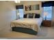 Spacious main bedroom with windows and decorative lamps at 2152 S Olivewood --, Mesa, AZ 85209