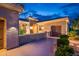 Well-maintained home with charming curb appeal, featuring manicured landscaping and a spacious driveway at 22912 N San Ramon Ct, Sun City West, AZ 85375